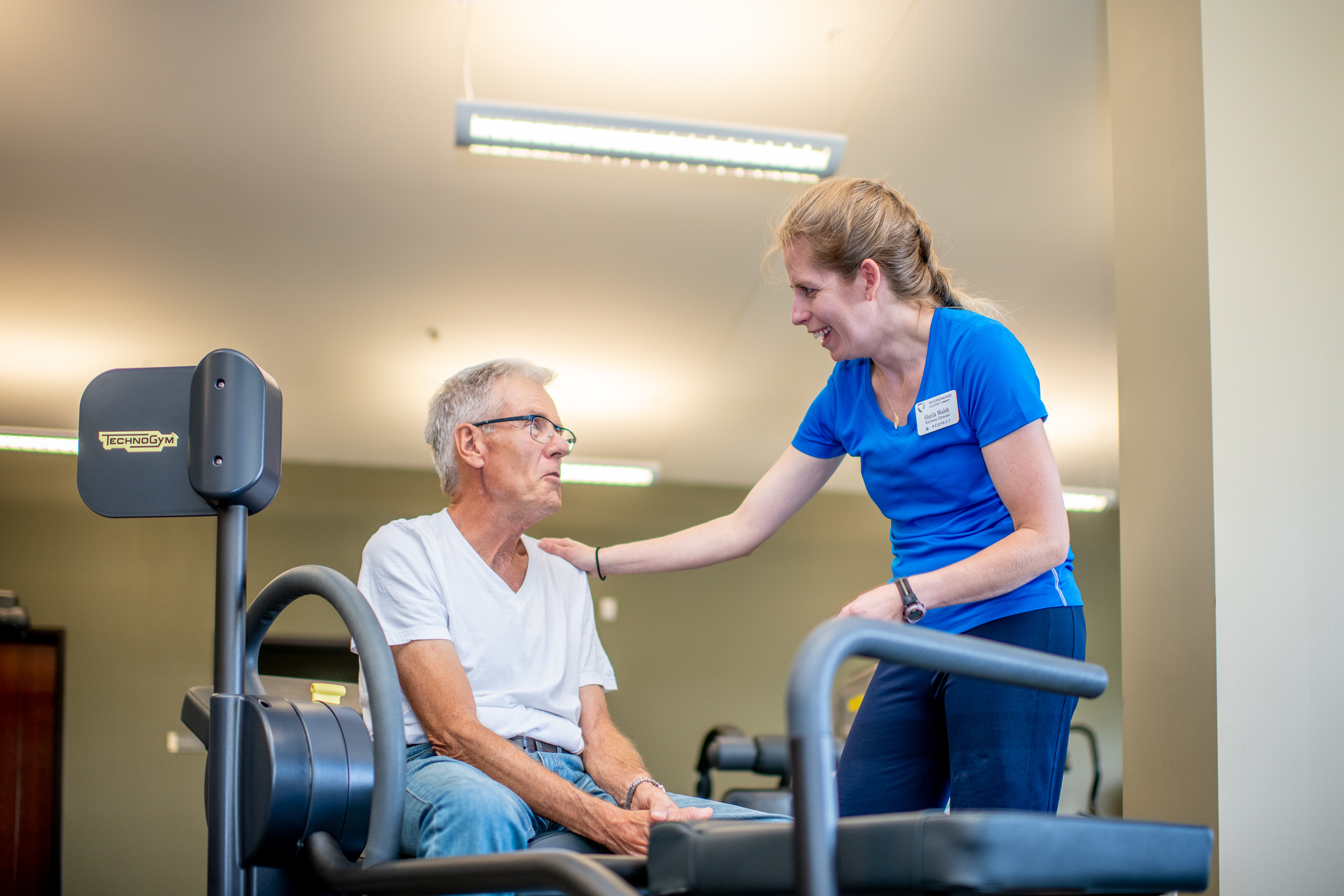 _DSC3597 Nurse assisting elderly man in a physical therapy session - memory care centers